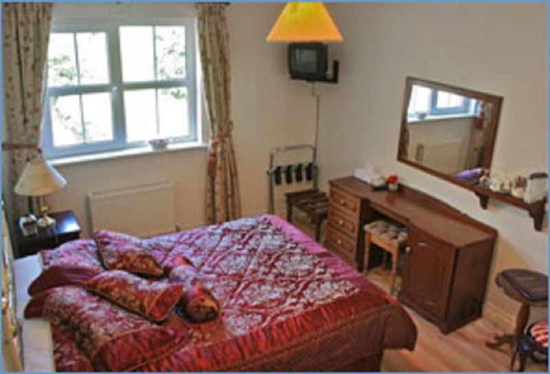 Tom & Eileen'S Farm Hotel คาสเซิลเมน ภายนอก รูปภาพ